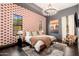 Primary bedroom with southwestern-inspired decor and large windows at 23414 N 84Th Pl, Scottsdale, AZ 85255