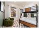 Bedroom with bunk beds and green accent wall at 23414 N 84Th Pl, Scottsdale, AZ 85255