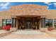 Elegant entryway with stone accents and wrought iron doors at 23414 N 84Th Pl, Scottsdale, AZ 85255