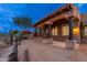 Exterior view of house with covered patio and landscaping at 23414 N 84Th Pl, Scottsdale, AZ 85255