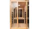 Modern infrared sauna with glass door at 23414 N 84Th Pl, Scottsdale, AZ 85255