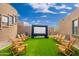 Enjoy outdoor movies on the large projector screen surrounded by comfortable seating at 23414 N 84Th Pl, Scottsdale, AZ 85255