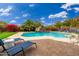 Luxury pool and patio area with lounge chairs at 23414 N 84Th Pl, Scottsdale, AZ 85255