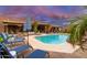 Stunning pool with patio furniture and a beautiful sunset view at 23414 N 84Th Pl, Scottsdale, AZ 85255