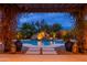 Serene pool and spa area with a rock waterfall feature at 23414 N 84Th Pl, Scottsdale, AZ 85255