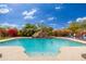 Relaxing pool with a rock waterfall feature at 23414 N 84Th Pl, Scottsdale, AZ 85255