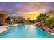 Inviting pool and patio with a gorgeous sunset backdrop at 23414 N 84Th Pl, Scottsdale, AZ 85255