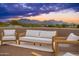 Spacious rooftop terrace with mountain views, comfortable seating and stylish decor at 23414 N 84Th Pl, Scottsdale, AZ 85255