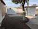 Backyard with shed and gravel ground at 2460 E Main St # N12, Mesa, AZ 85213