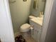 Clean bathroom with toilet, sink, and shower at 2460 E Main St # N12, Mesa, AZ 85213