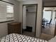 Bedroom with double bed and access to closet and dining area at 2460 E Main St # N12, Mesa, AZ 85213