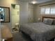 Bright bedroom with double bed, built-in closet, and ensuite bathroom at 2460 E Main St # N12, Mesa, AZ 85213