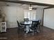 Dining area with a round table and four chairs at 2460 E Main St # N12, Mesa, AZ 85213