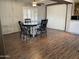 Dining area with round table and four chairs at 2460 E Main St # N12, Mesa, AZ 85213