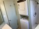 Stackable washer and dryer in a small laundry room at 2460 E Main St # N12, Mesa, AZ 85213