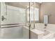 Bathroom with shower and bathtub, featuring a window at 26015 N 53Rd Dr, Phoenix, AZ 85083