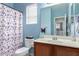 Clean bathroom with a shower/tub combo and wood vanity at 26015 N 53Rd Dr, Phoenix, AZ 85083