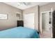 Bright bedroom with a double bed and closet at 26015 N 53Rd Dr, Phoenix, AZ 85083