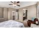 Bright bedroom with king-size bed and ensuite bathroom at 26015 N 53Rd Dr, Phoenix, AZ 85083