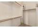 Large walk-in closet with double hanging rods and shelves at 26015 N 53Rd Dr, Phoenix, AZ 85083