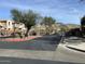 Gated community entrance with mountain views and well-maintained landscaping at 26015 N 53Rd Dr, Phoenix, AZ 85083