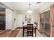 Dining area with hardwood floors and a table with four chairs at 26015 N 53Rd Dr, Phoenix, AZ 85083