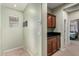 Home hallway with built-in cabinets and dark countertop at 26015 N 53Rd Dr, Phoenix, AZ 85083