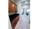 View down hallway with built-in cabinets and bedrooms at 26015 N 53Rd Dr, Phoenix, AZ 85083