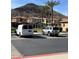 Two vehicles parked in a community parking lot at 26015 N 53Rd Dr, Phoenix, AZ 85083