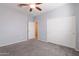 Spacious bedroom with large closet and neutral carpeting at 2702 E Saddlebrook Rd, Gilbert, AZ 85298