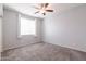 Bedroom with ceiling fan and window coverings at 2702 E Saddlebrook Rd, Gilbert, AZ 85298