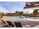 Resort-style pool with a splash pad area at 2702 E Saddlebrook Rd, Gilbert, AZ 85298