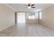 Spacious living room with tile flooring and ceiling fan at 2702 E Saddlebrook Rd, Gilbert, AZ 85298