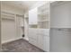 Large walk-in closet with ample shelving and hanging space at 2702 E Saddlebrook Rd, Gilbert, AZ 85298