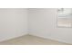 Empty bedroom with light walls and wood-look floors at 27256 N 74Th Ln, Peoria, AZ 85383