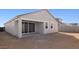 House exterior with covered patio at 27256 N 74Th Ln, Peoria, AZ 85383