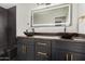 Modern bathroom with double vanity and black finishes at 2742 S Jacob St, Gilbert, AZ 85295