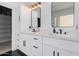 Modern bathroom with double vanity and walk in closet at 2742 S Jacob St, Gilbert, AZ 85295