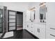 Modern bathroom with double vanity and hexagon tile floors at 2742 S Jacob St, Gilbert, AZ 85295