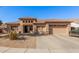 Single-story home with a two-car garage and landscaped yard at 2742 S Jacob St, Gilbert, AZ 85295