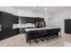 Modern kitchen with a large island and black cabinetry at 2742 S Jacob St, Gilbert, AZ 85295