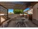 Covered patio with built-in seating and a grill area at 2742 S Jacob St, Gilbert, AZ 85295