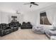 Home theater with black recliner seating and light wood floors at 2742 S Jacob St, Gilbert, AZ 85295