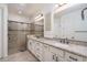 Bathroom with double vanity, granite countertops, and a walk-in shower at 28226 N Crook Ct, Rio Verde, AZ 85263