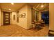 Welcoming entryway with tiled flooring and wrought iron front door at 28226 N Crook Ct, Rio Verde, AZ 85263