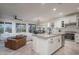 Spacious kitchen with island, stainless steel appliances, and white cabinets at 28226 N Crook Ct, Rio Verde, AZ 85263