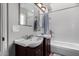 Clean bathroom with double sinks and a shower/tub combo at 2824 S Bala Dr, Tempe, AZ 85282