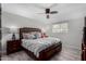 Main bedroom with dark wood furniture and ceiling fan at 2824 S Bala Dr, Tempe, AZ 85282