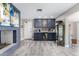 Modern kitchen with dark blue cabinetry and island at 2824 S Bala Dr, Tempe, AZ 85282