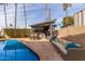 Inviting pool area with a covered patio and seating at 2824 S Bala Dr, Tempe, AZ 85282